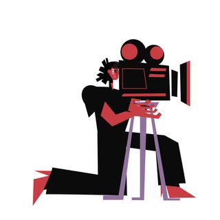 cameraman filming television studio